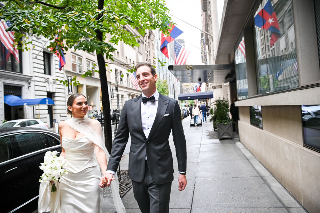 Bride and groom sharing a candid, emotional moment during their wedding in New York City, captured by Patken Photographer.