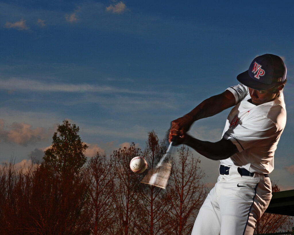 Windermere prepthemed senior photography baseball senior portrait action shot at sunset