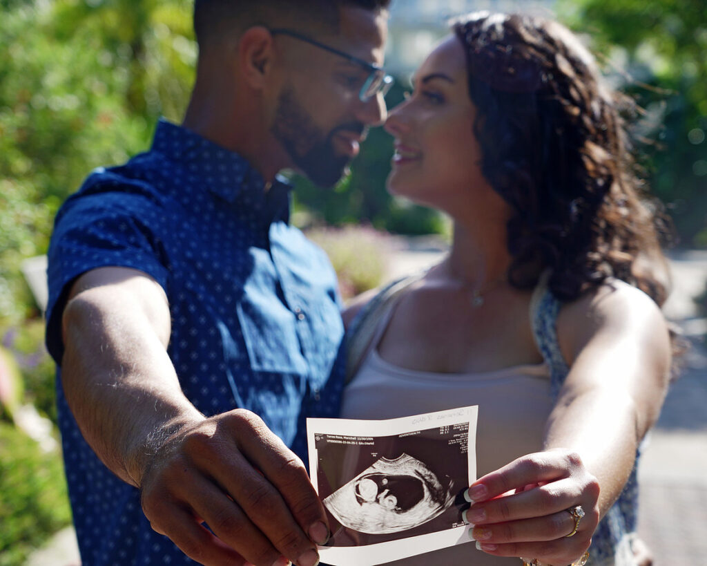 maternity photography couple holding ultrasound close-up by Patken Photographer
