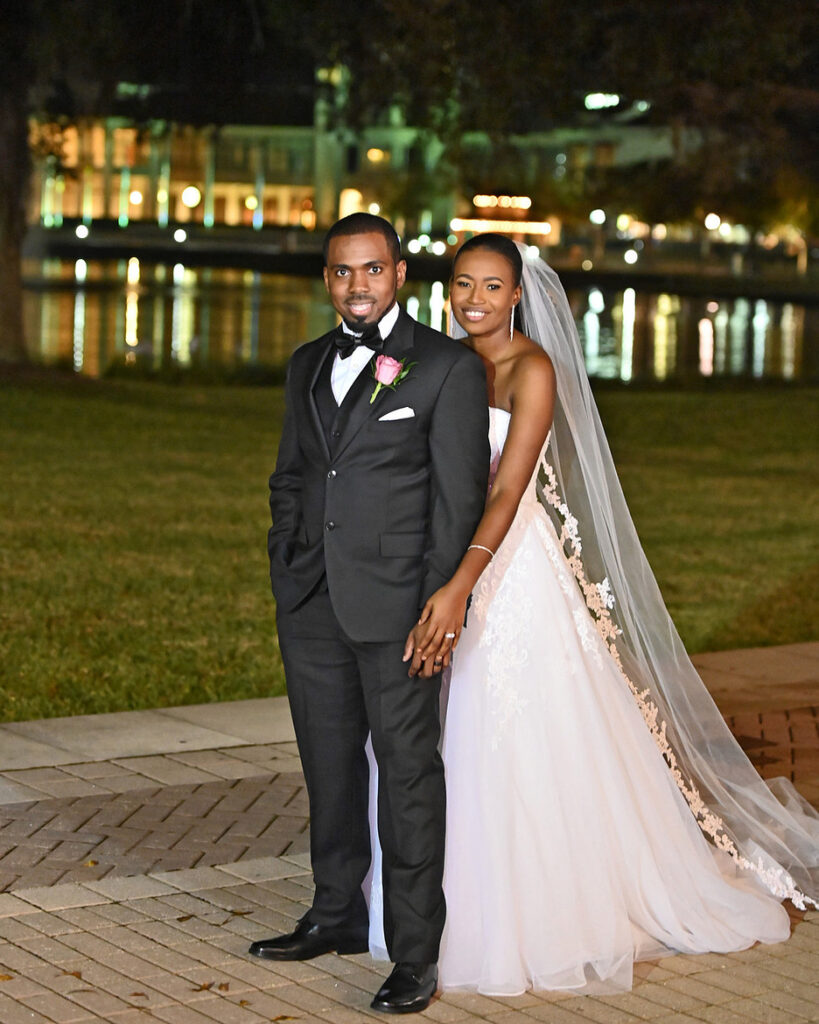 photographing people of color night couple portrait with flattering lighting and city lights