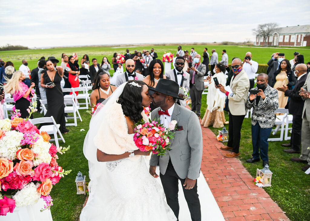 photographing people of color wedding ceremony aisle walk candid emotional moment