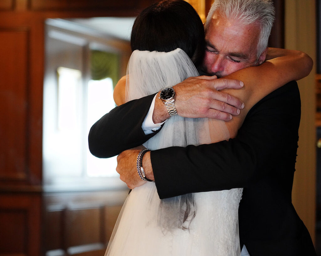 Dad and Daughter First Look wedding photo with emotional reaction