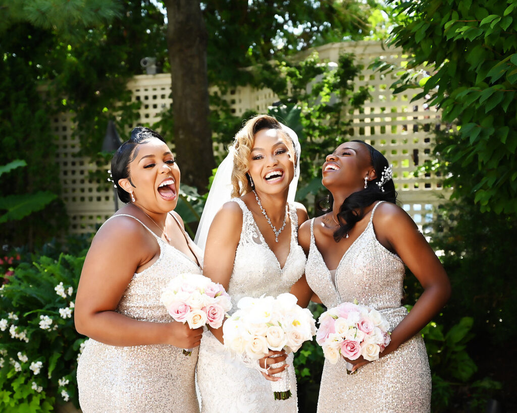 storytelling wedding photography of bridesmaids laughing together holding bouquets