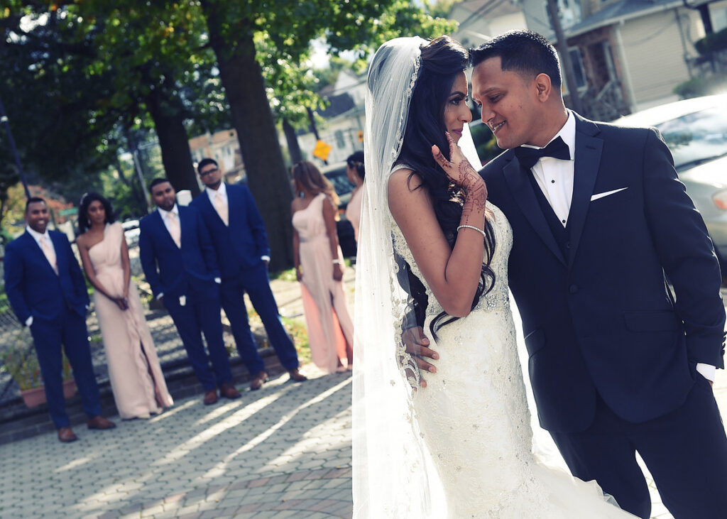 storytelling wedding photography of couple embracing with emotional moment during wedding day