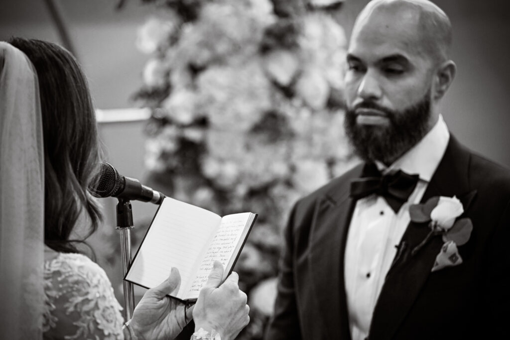 Black and white portrait of groom during ceremony at Crescent Beach Club Long Island New York