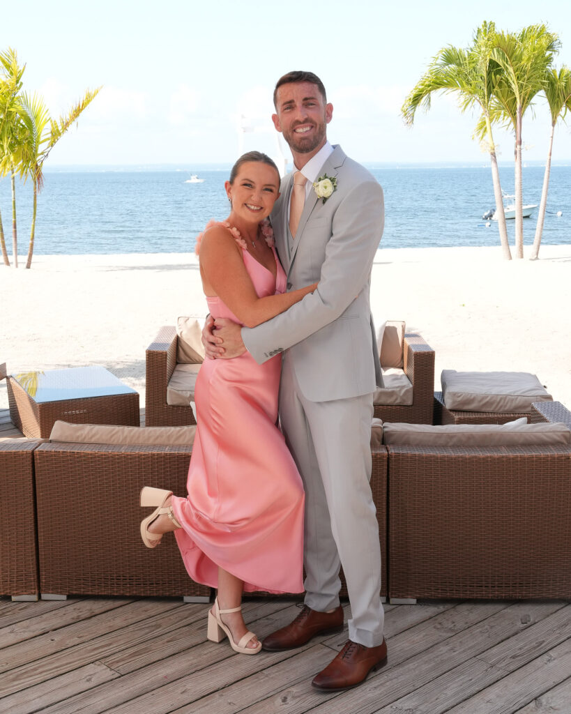 Groom with Sister fun portrait by the ocean at Crescent Beach Club Long Island New York wedding