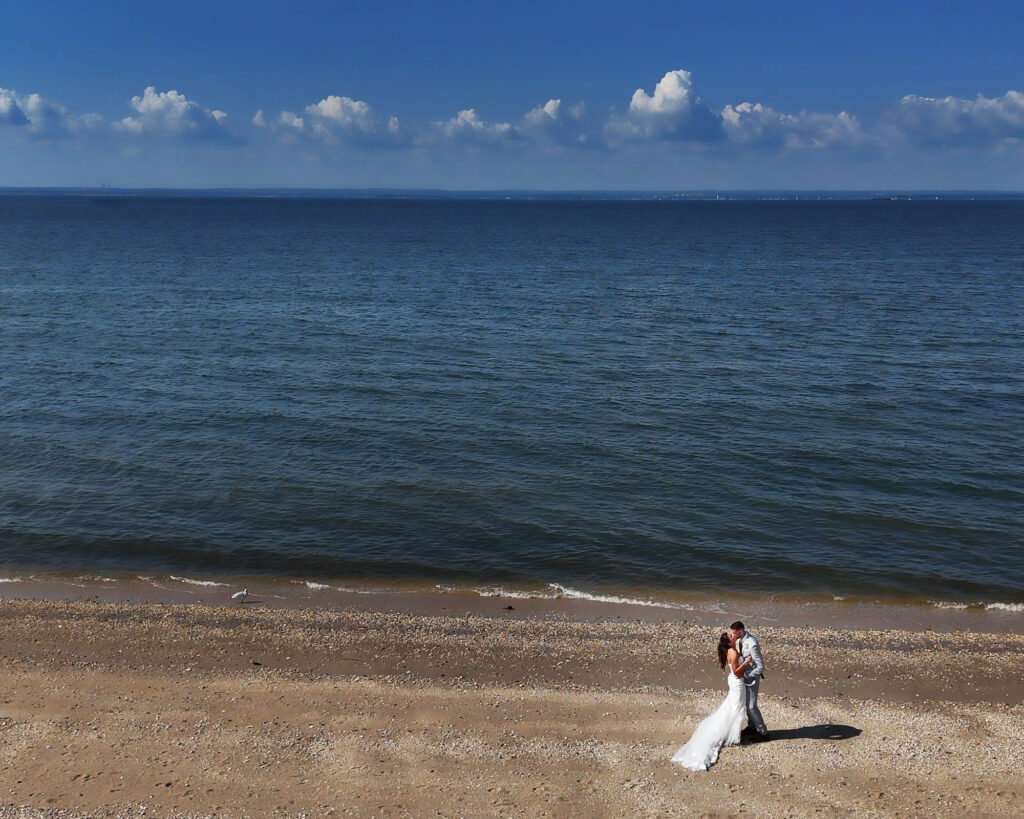 Drone beach wedding portrait at Crescent Beach Club in Long Island New York photographed by Doug Gordon of Patken Photographer