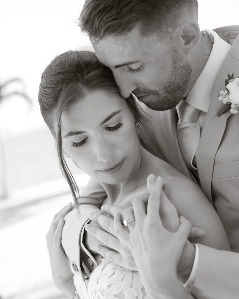 Black and white intimate couple portrait at Crescent Beach Club Long Island New York wedding photographed by Doug Gordon of Patken Photographer