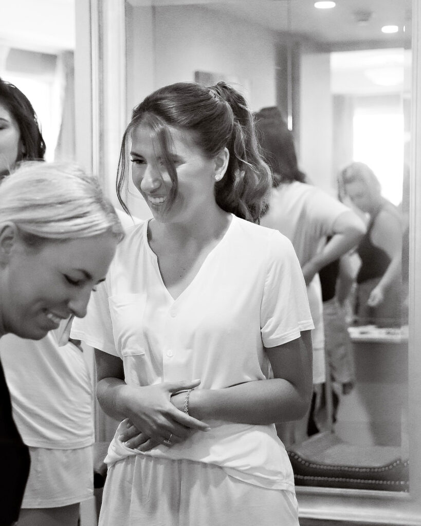 Black and white getting ready candid at Crescent Beach Club Long Island New York wedding photographed by Doug Gordon of Patken Photographer