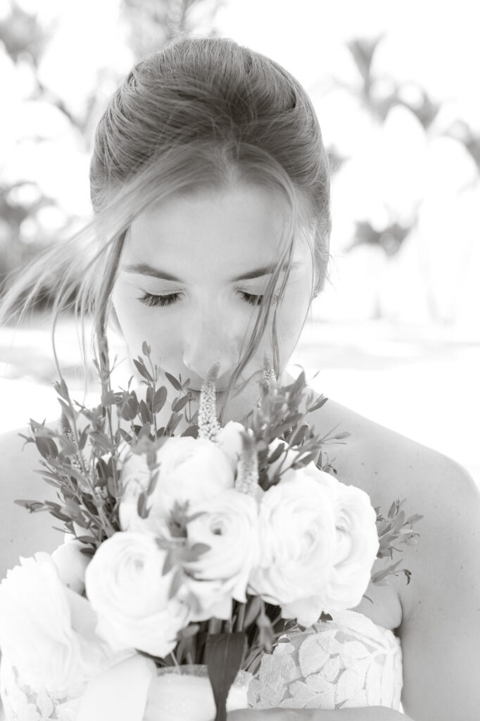 Black and white bridal portrait with bouquet at Crescent Beach Club Long Island New York photographed by Doug Gordon of Patken Photographer
