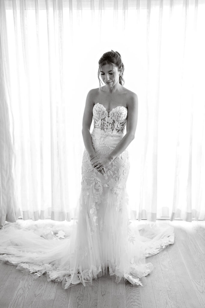 Black and white full length bridal portrait at Crescent Beach Club Long Island New York photographed by Doug Gordon of Patken Photographer