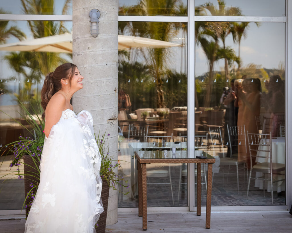 Bride portrait by glass doors at Crescent Beach Club Long Island New York wedding photographed by Doug Gordon of Patken Photographer