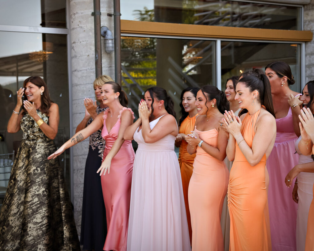 Bridesmaids cheering lineup at Crescent Beach Club Long Island New York wedding photographed by Doug Gordon of Patken Photographer