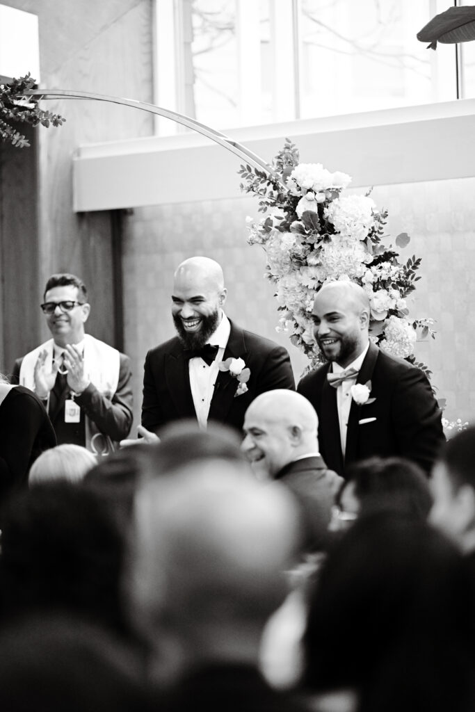 Black and white candid ceremony moment at Crescent Beach Club Long Island New York