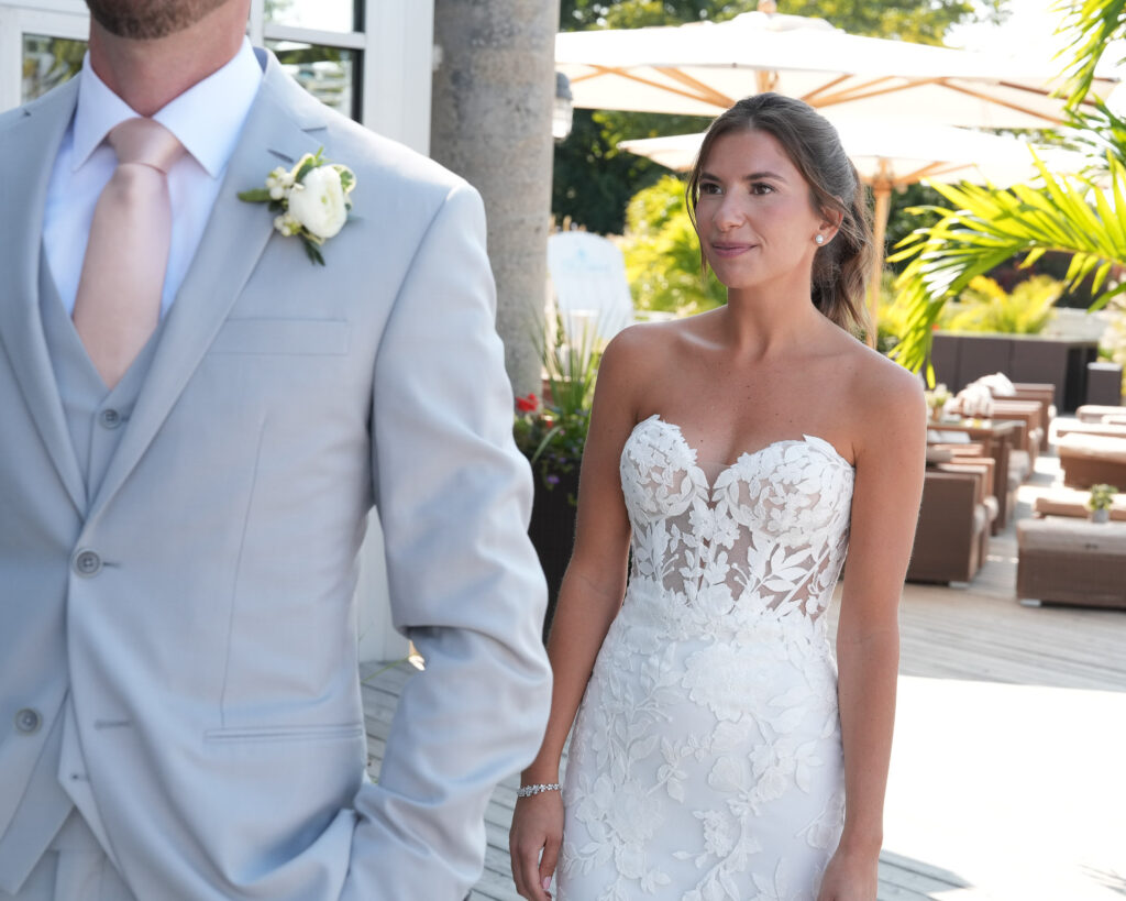 Couple portrait with palms and ocean light.