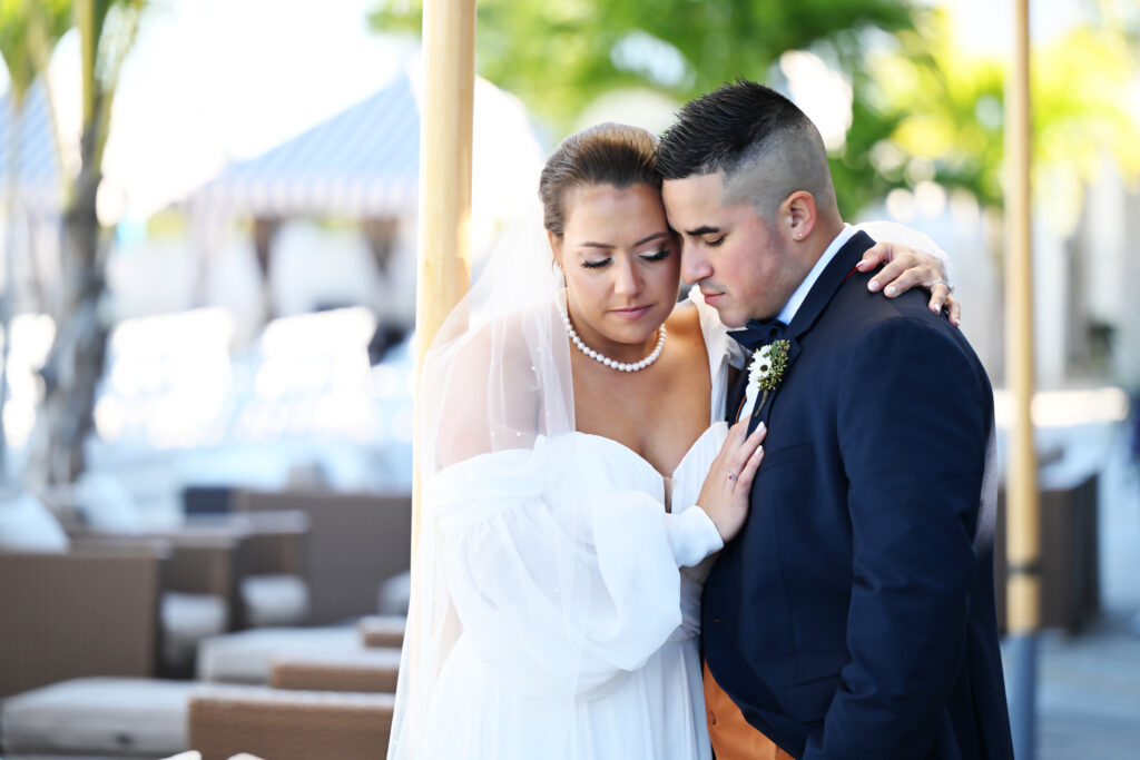 Bride and groom close portrait on the deck at Crescent Beach Club wedding Long Island New York