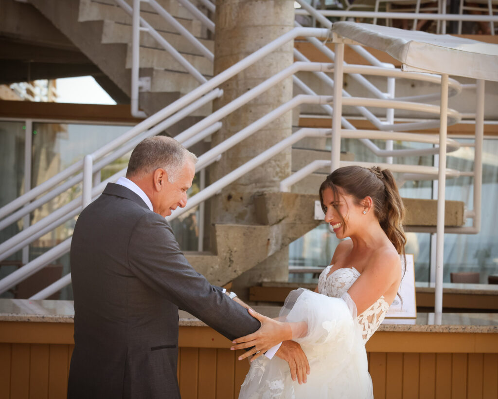 Father holding bride’s hands during emotional moment at Crescent Beach Club wedding Long Island New York