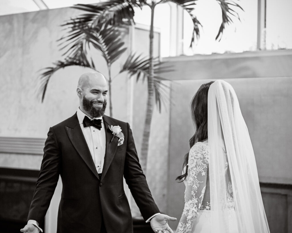 Black and white first look moment with bride and groom at Crescent Beach Club Long Island New York