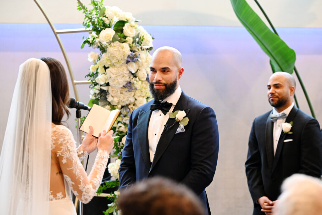 Groom portrait during wedding ceremony at Crescent Beach Club Long Island New York