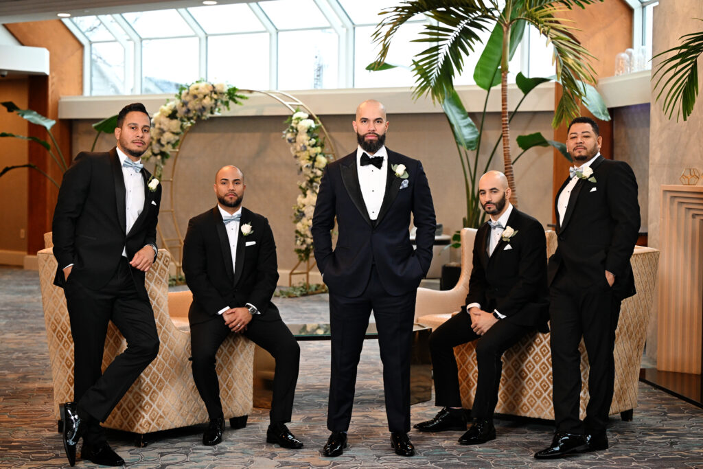 Groomsmen group portrait with groom at Crescent Beach Club Long Island New York
