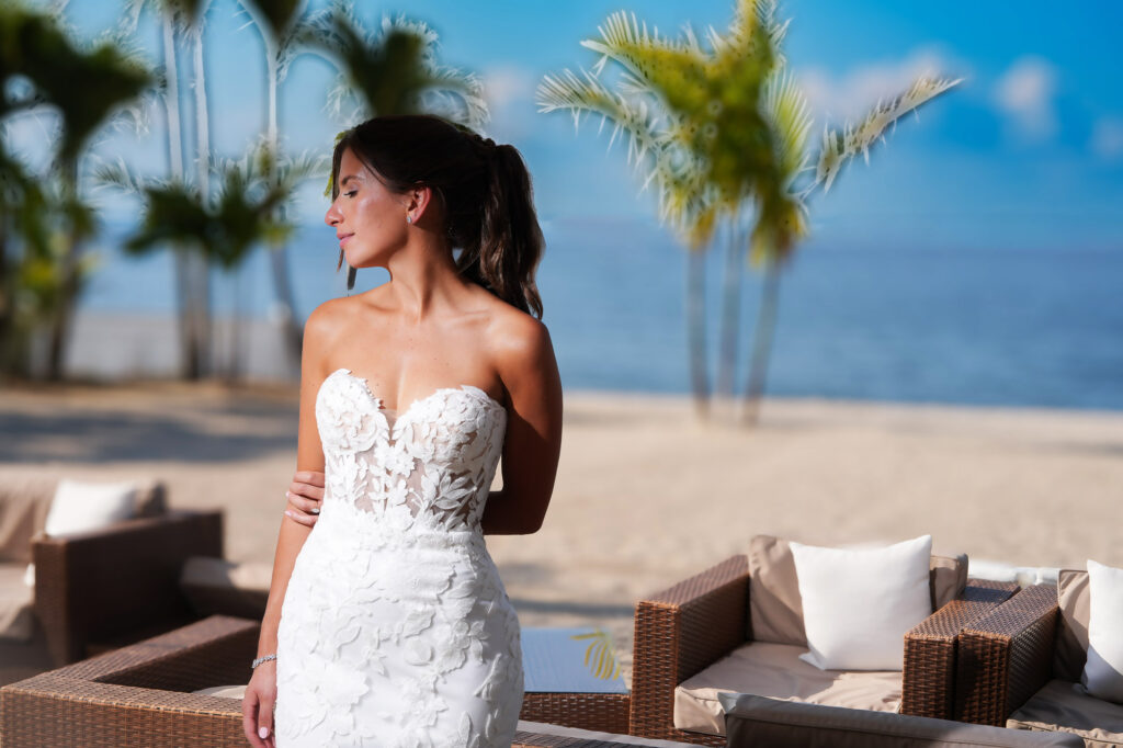 Bride portrait with ocean and palm trees at Crescent Beach Club wedding Long Island New York