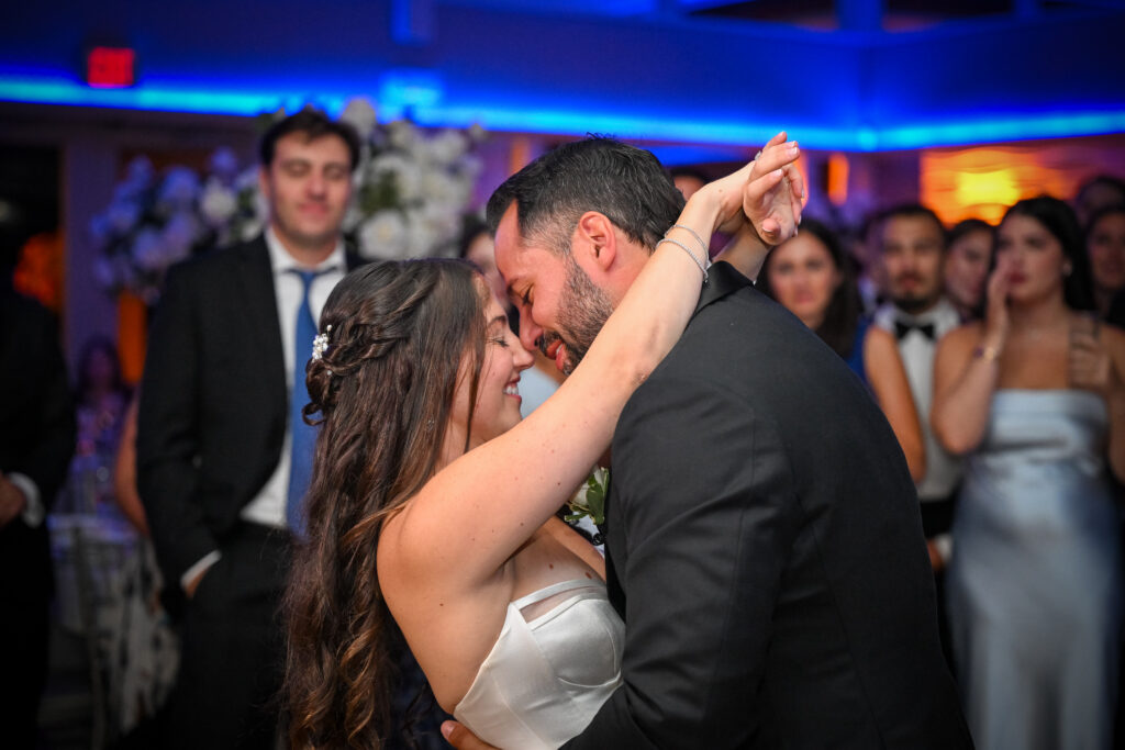Bride and groom share an intimate dance during reception at Crescent Beach Club, Long Island, New York.