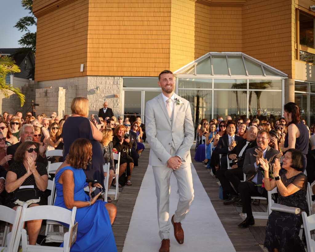 Crescent Beach Club wedding photo at Bayville, Long Island, New York: crescent beach club wedding groom processional aisle. Photo by Doug Gordon | Patken Photographer.