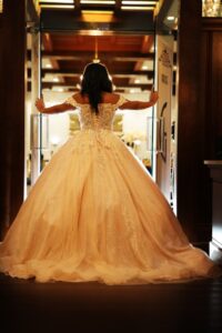 Sweet 16 princess gown portrait captured at Gatsby on the Ocean, photographed by Doug Gordon of Patken Photographer, featuring elegant styling and a waterfront setting.