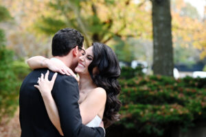 Bride and groom hugging during their wedding reception at Gala Events on Long Island