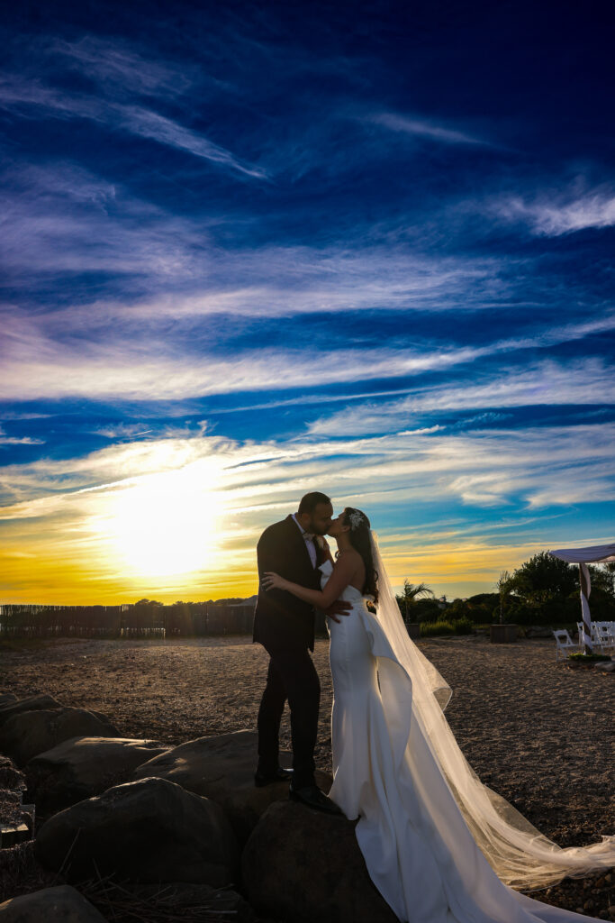 doug-gordon-patken-photographer-wedding-photos-Land's-End-first-reveal-on-beach