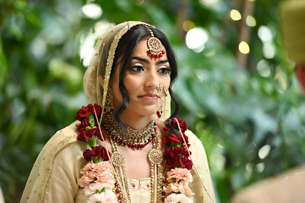 Indian bride portrait with traditional jewelry at Flowerfield wedding