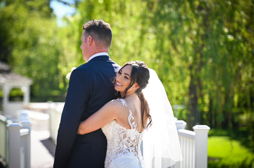 Bride and groom romantic garden portrait at Flowerfield wedding venue
