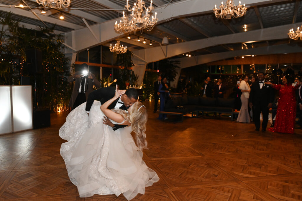 Wedding couple dancing at reception in Flowerfield St. James NY