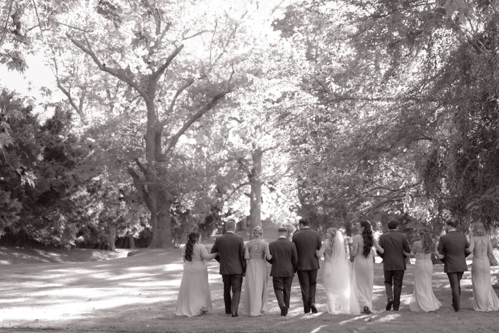 Wedding couple walking through gardens at Flowerfield Long Island