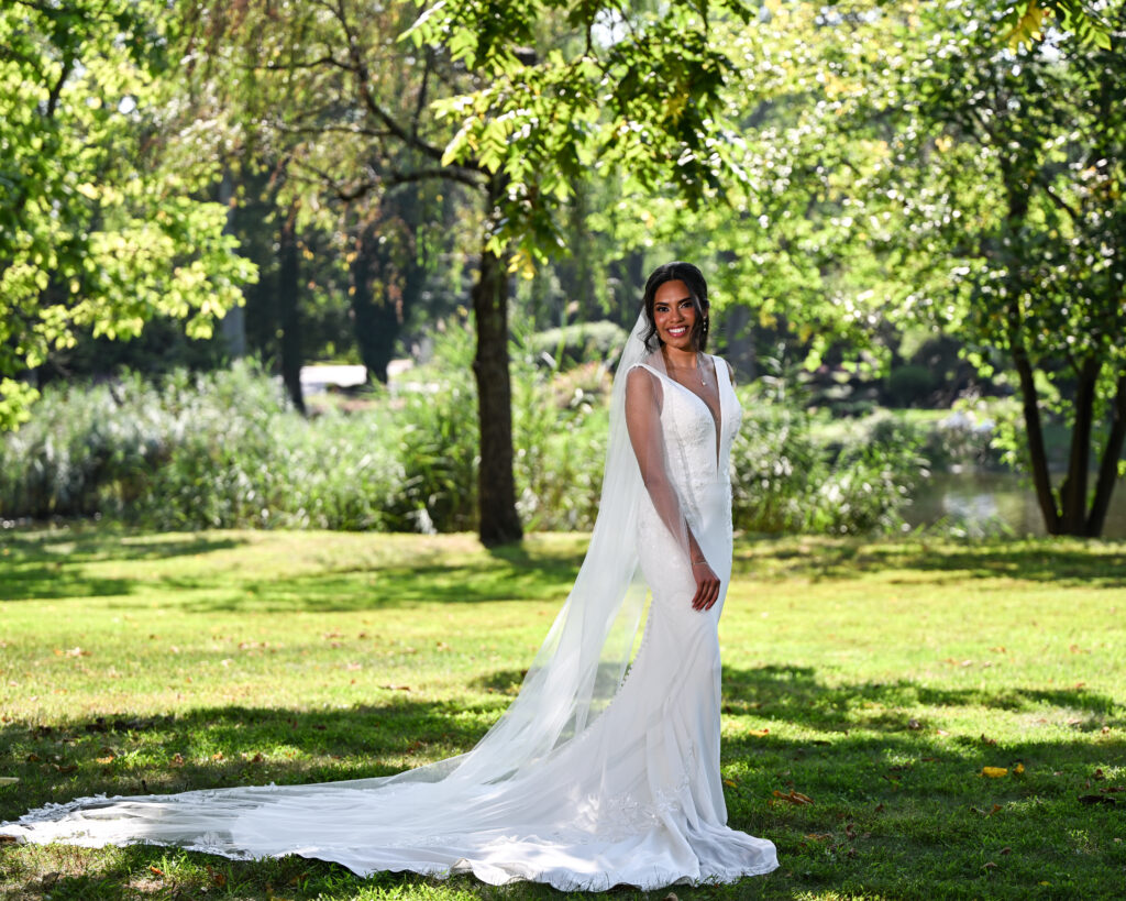 Bride standing in garden at Flowerfield St. James wedding