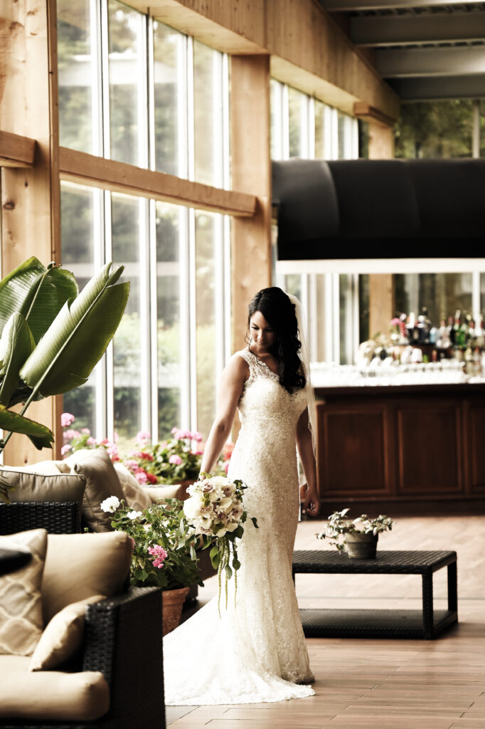 Bride portrait inside modern reception space at Flowerfield