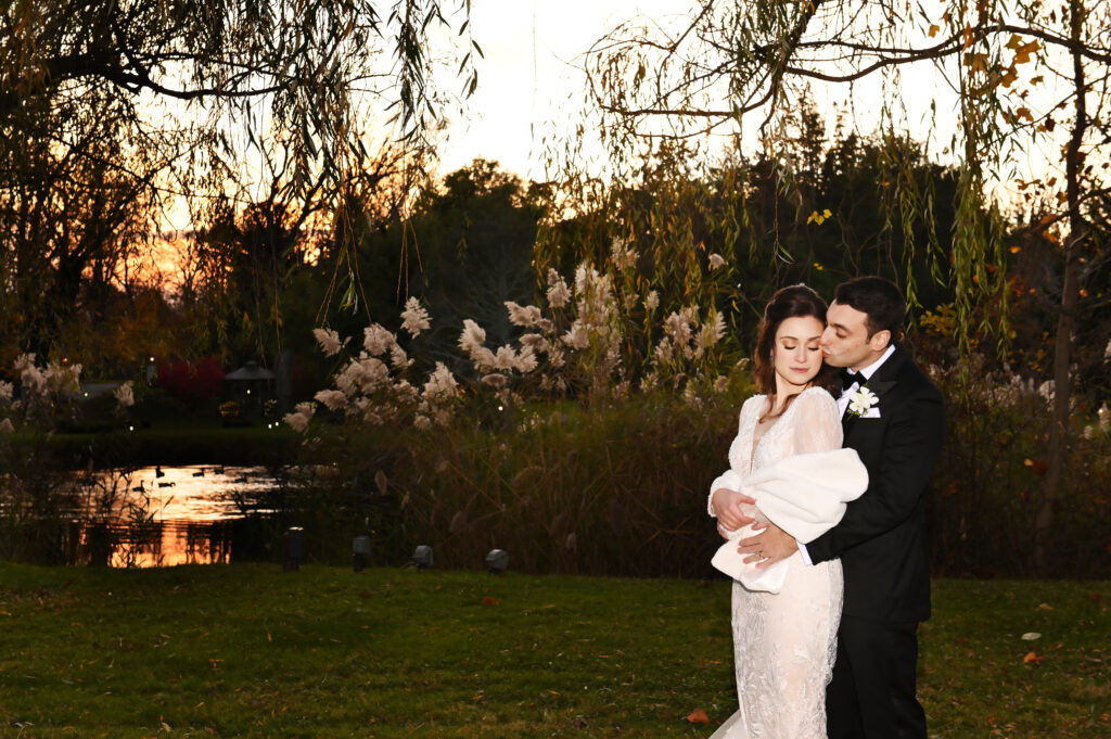 Sunset wedding portrait of bride and groom at Flowerfield St. James NY