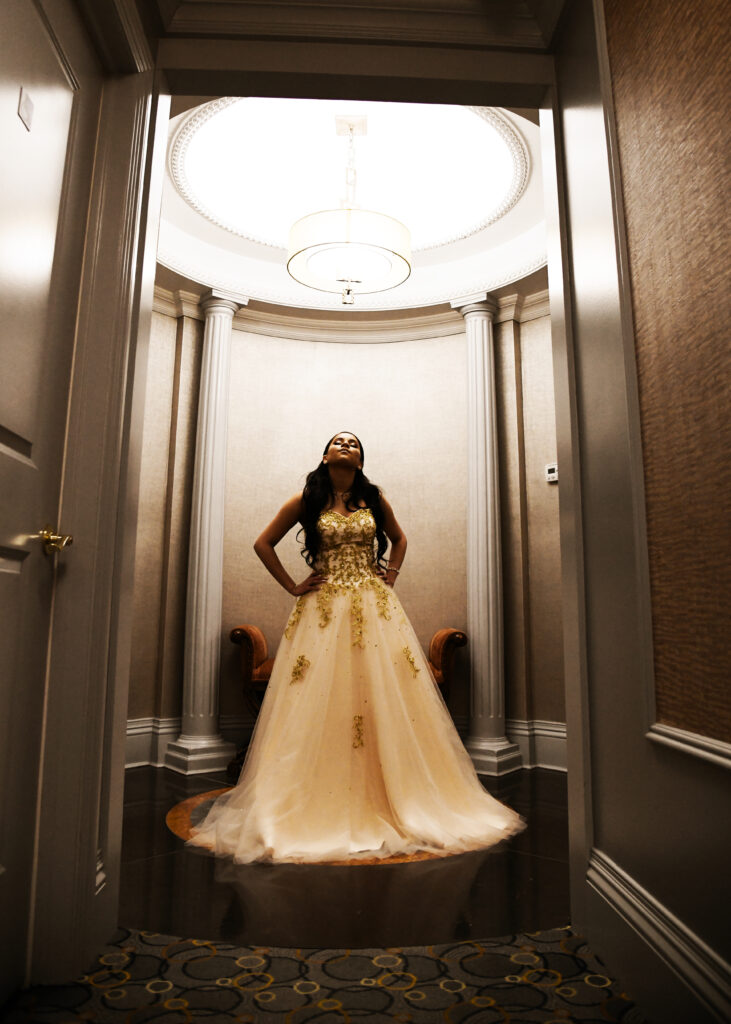 Candid Sweet 16 gown portrait captured at Jericho Terrace on Long Island, featuring natural expression and elegant styling.