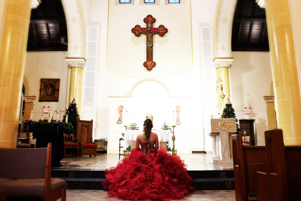 Sweet 16 cathedral-style portrait captured in New York, featuring grand architecture and dramatic light.