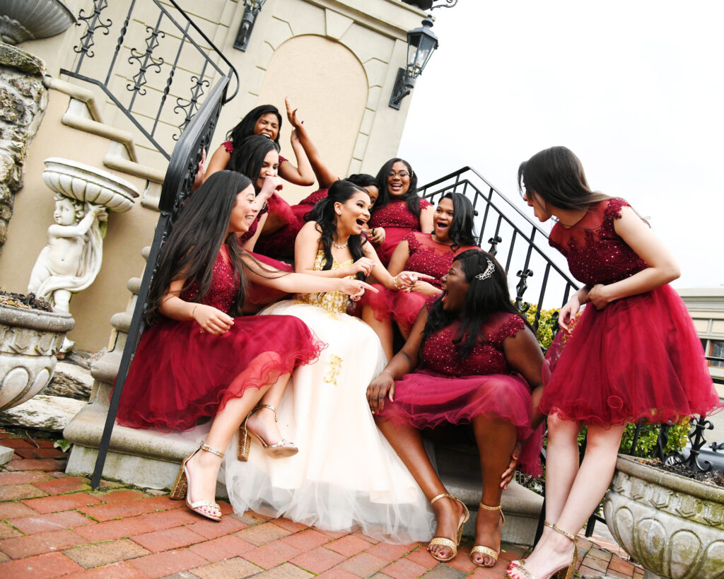 Sweet 16 court of honor celebration portrait captured on Long Island, featuring formal posing, elegant attire, and a ceremonial moment.