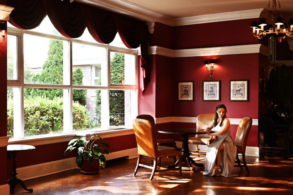 Editorial-style indoor Sweet 16 portrait captured at The Lannin on Long Island, featuring refined lighting and elegant styling.