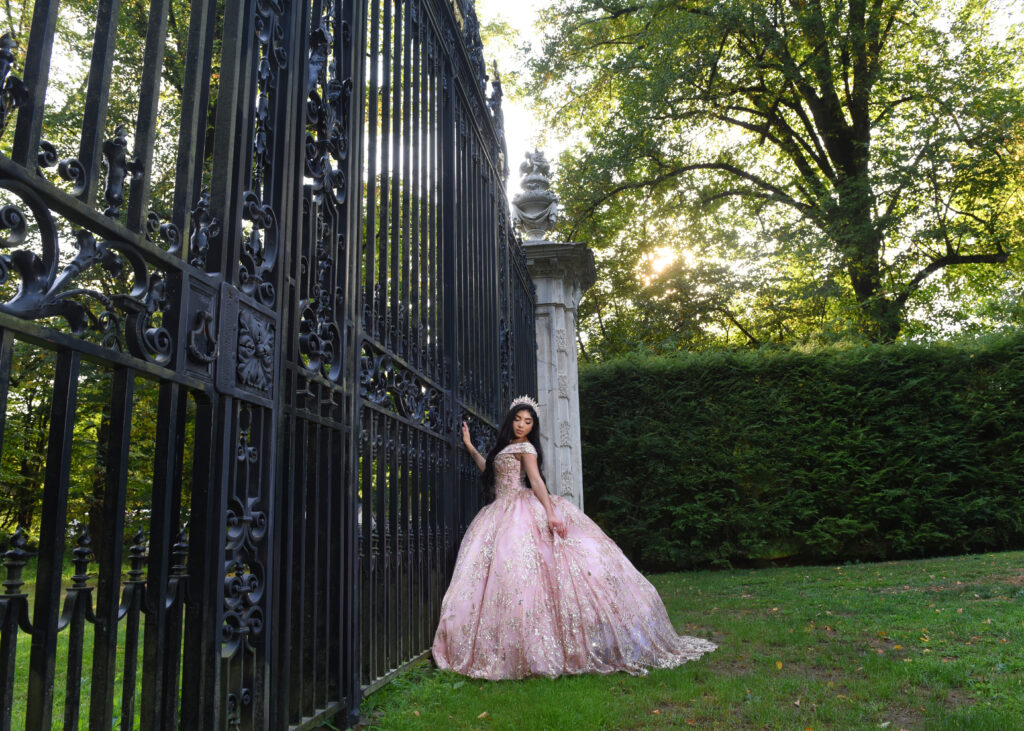 Evening Sweet 16 portrait captured at Old Westbury Gardens on Long Island, featuring soft nighttime light and an elegant atmosphere.