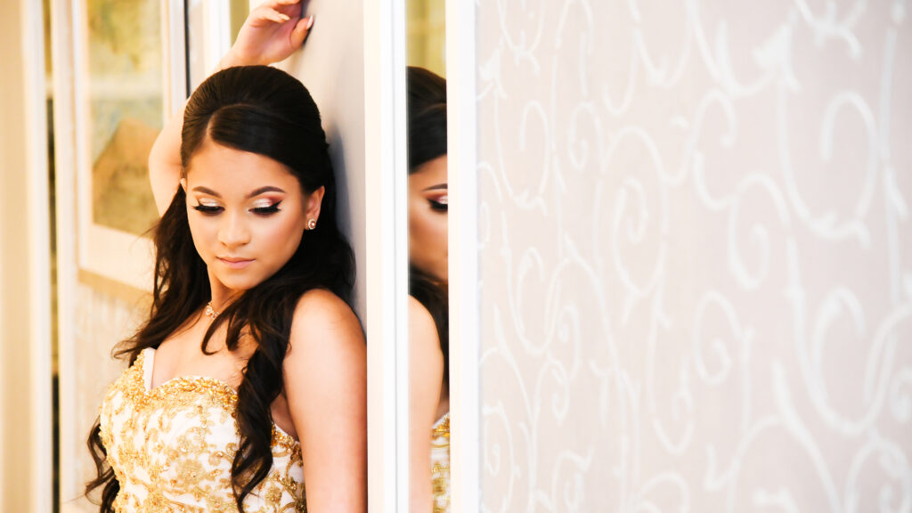 Glamour-style Sweet 16 portrait captured at Jericho Terrace on Long Island, featuring elegant styling and dramatic lighting.