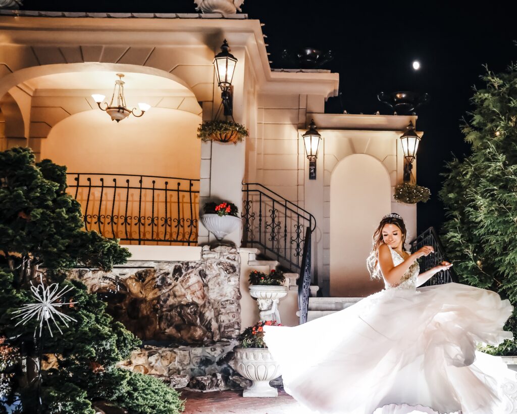 Sweet 16 night portrait in a formal gown captured at Jericho Terrace, featuring elegant mansion architecture and evening light.