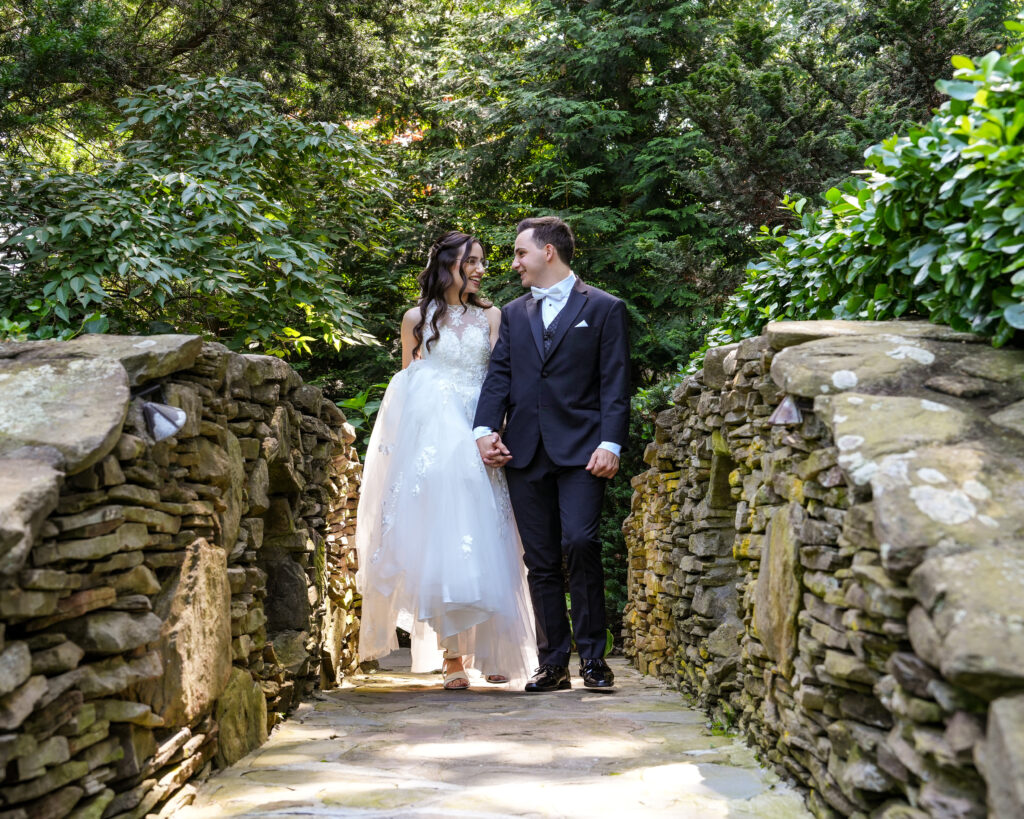 Bride and groom dramatic staircase portrait inside Westbury Manor