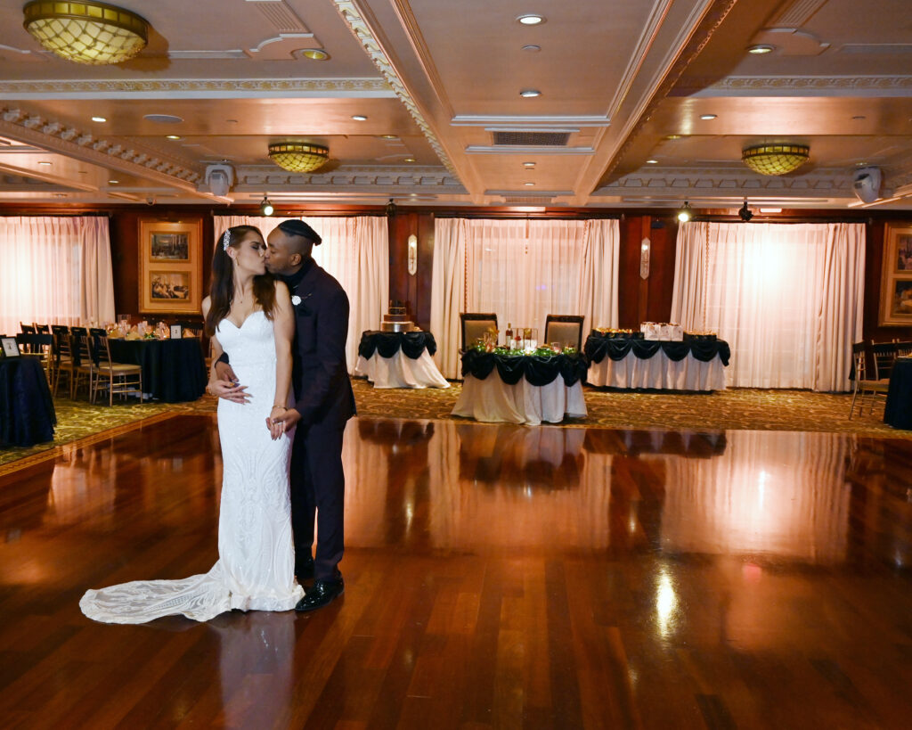Bride and groom dancing in Westbury Manor ballroom Long Island