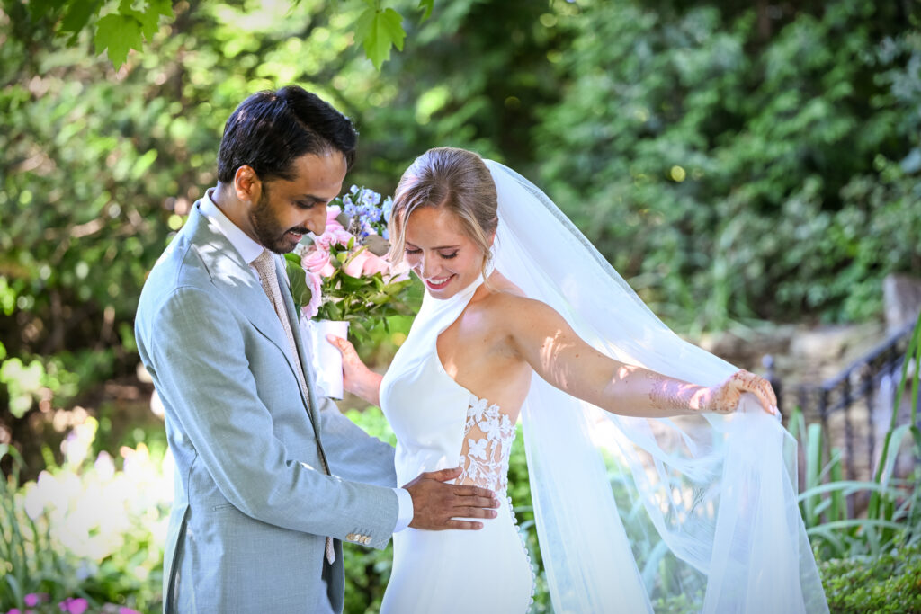 Bride and groom romantic portrait in Westbury Manor greenery Long Island