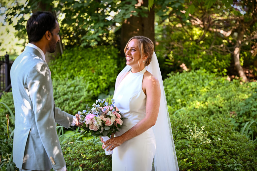 Outdoor floral ceremony setup in Westbury Manor gardens Long Island