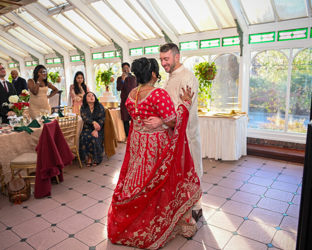 South Asian bride dancing during cocktail hour at Westbury Manor Long Island