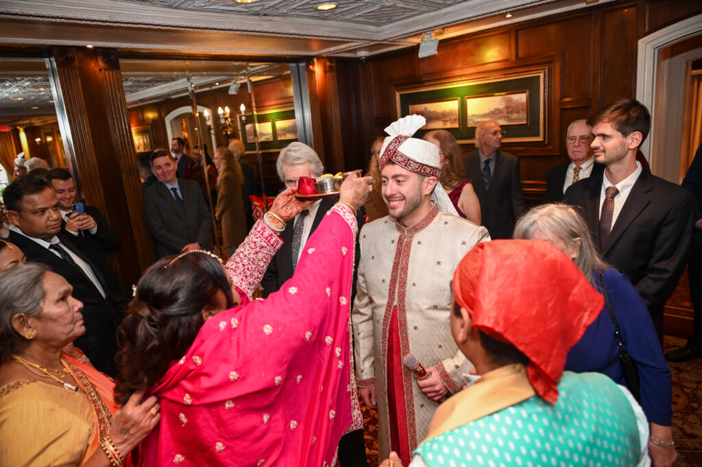 South Asian wedding reception moment inside Westbury Manor ballroom Long Island